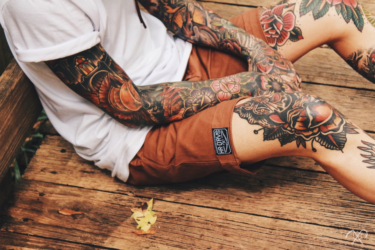 Brown tattooed asian dyke loves fan image