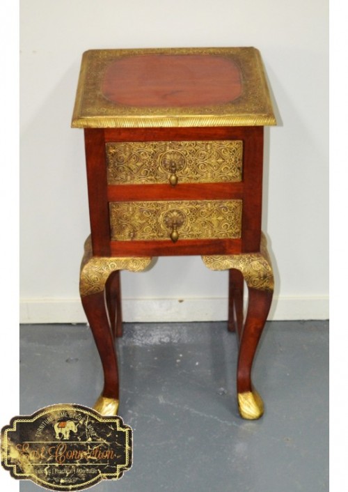 This piece of furniture has a high level or detailed craftsmanship; features hand pressed brass in traditional Indian patterns to give this piece a distinct character. Also serves a practical purpose as 2 drawers give some storage space.