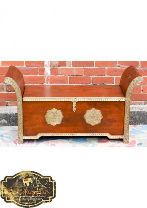 This amazing furniture has a high level or detailed craftsmanship; features hand pressed brass in traditional Indian patterns and a unique curved shape to the armrest give this piece a distinct character.